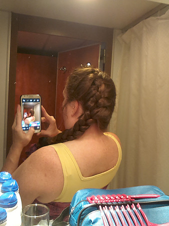 Braiding my hair for first dinner.