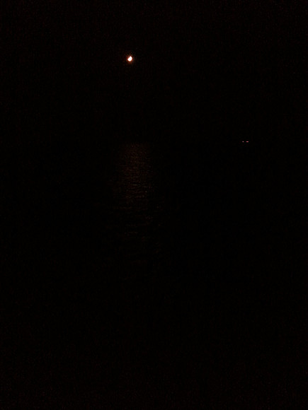 If you look close you will see the moon on the water and a ship off to the right.