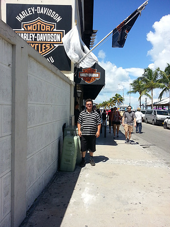 Greg under the Harley Davidson Nassau Sign.