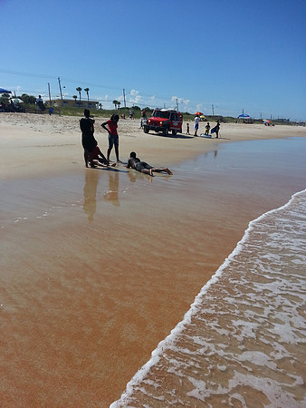 Lifeguard Jeep coming down the beach