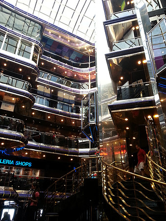 Looking up from the Lobby to the above floors. Glass elevators