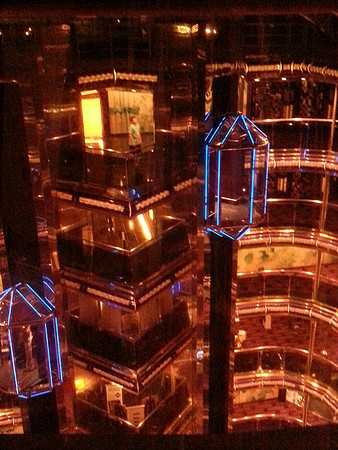 Glass elevators at night