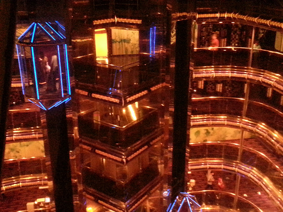 Glass elevators at night