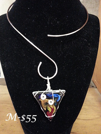 Roy G. BiV's Triangle comes with collar.
